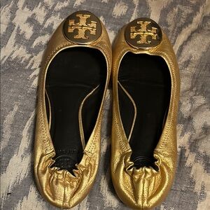 Tory Burch Gold Ballet Flats — mixed size — left is 7.5 and right is 8